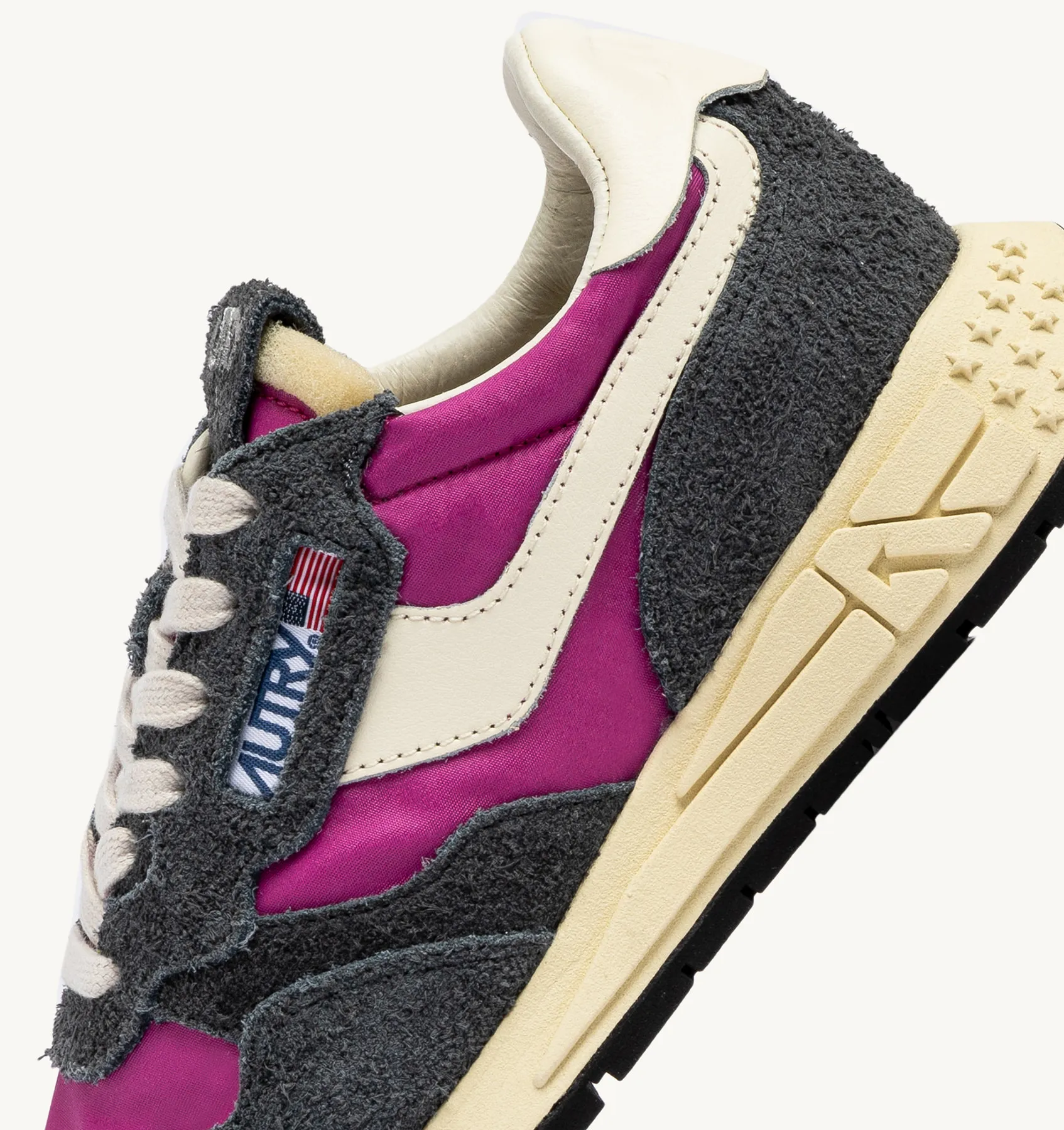 AUTRY NEW ARRIVALS WOMAN WOMAN  REELWIND LOW SNEAKERS IN FUCHSIA AND WHITE NYLON AND SUEDE