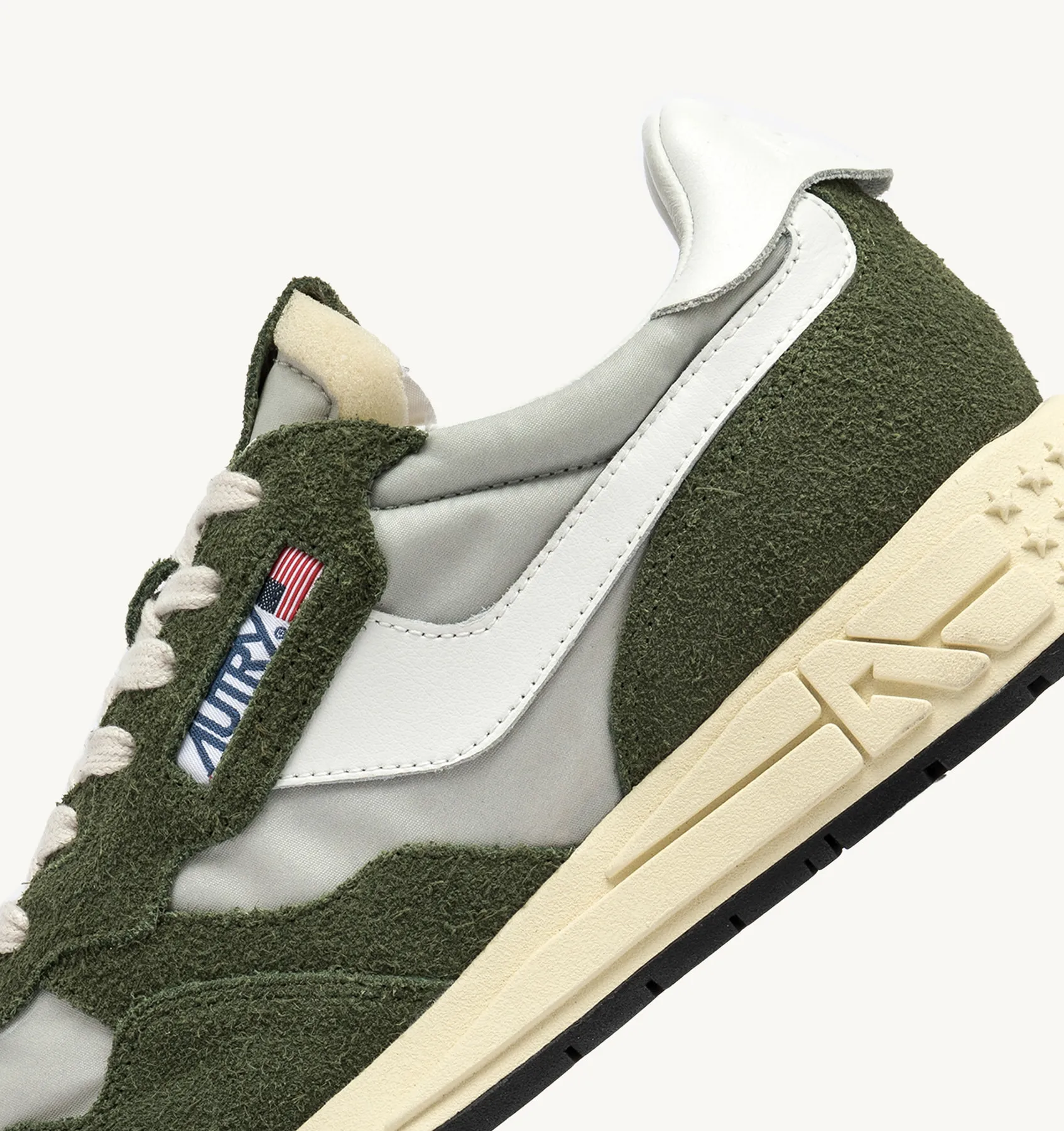 AUTRY NEW ARRIVALS WOMAN WOMAN  REELWIND LOW SNEAKERS IN GREEN AND WHITE NYLON AND SUEDE