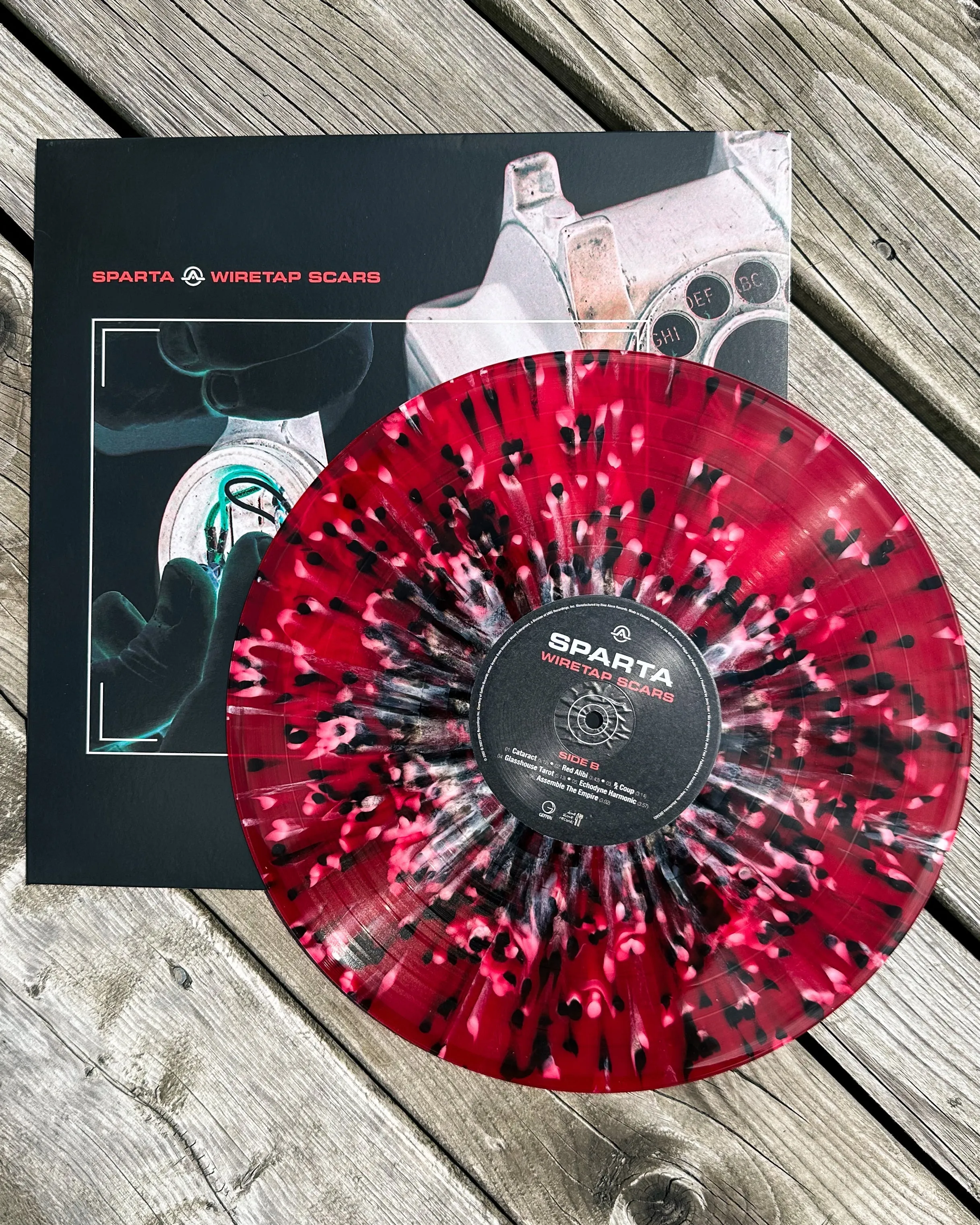 SPARTA ‘WIRETAP SCARS’ LP (Limited Edition – Only 350 Made, Translucent Red w/ Black & White Splatter Vinyl)